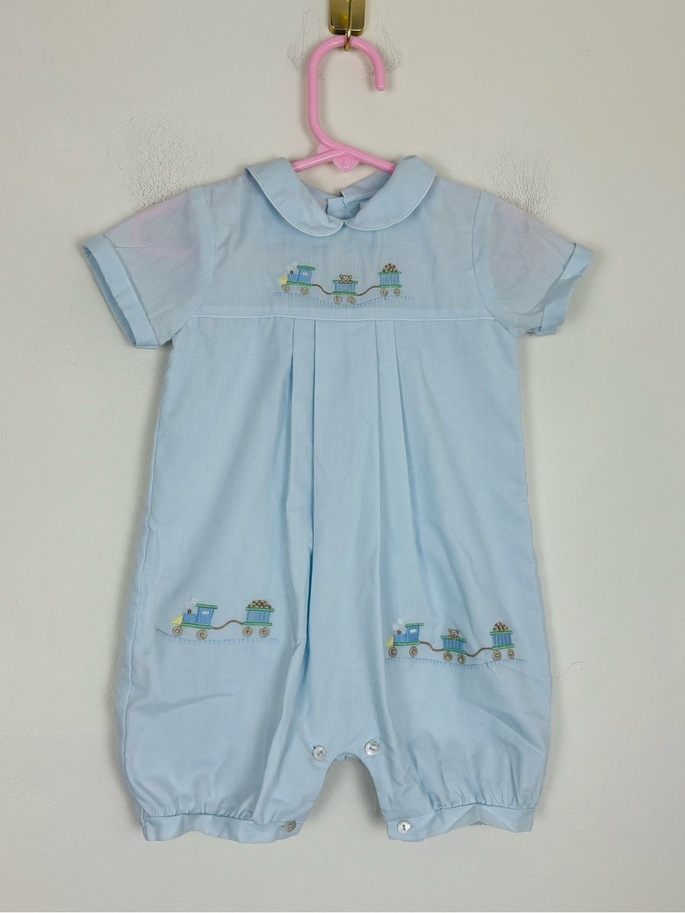 Sarah Louise England pale blue hand embroidered train motif bubble. 6 months